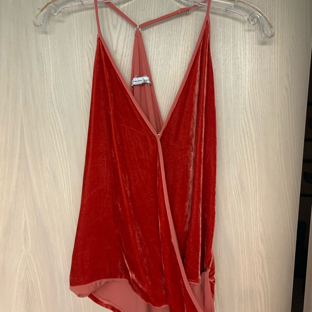 red/orange velvet top